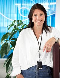 Porträtt av Erica Sundberg i kontorsmiljö